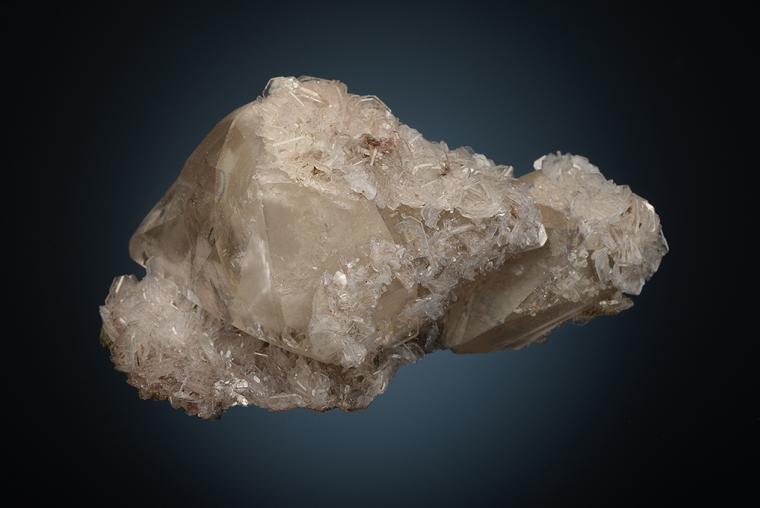 FLUORAPOPHYLLITE on CALCITE